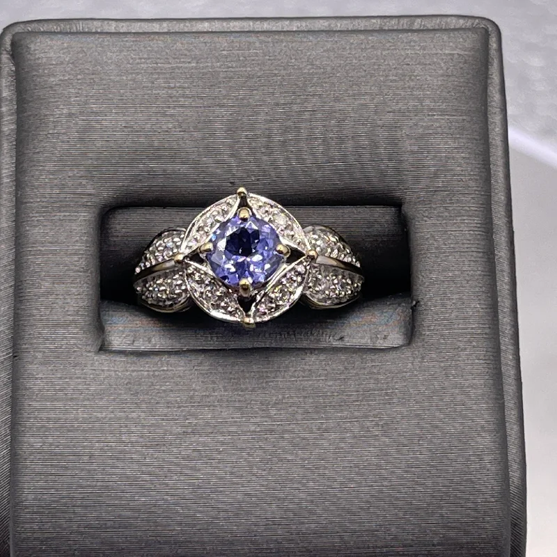 Bold engagement ring for women-18 Karat White Gold Blue Round Tanzanite And Diamond Halo Ring