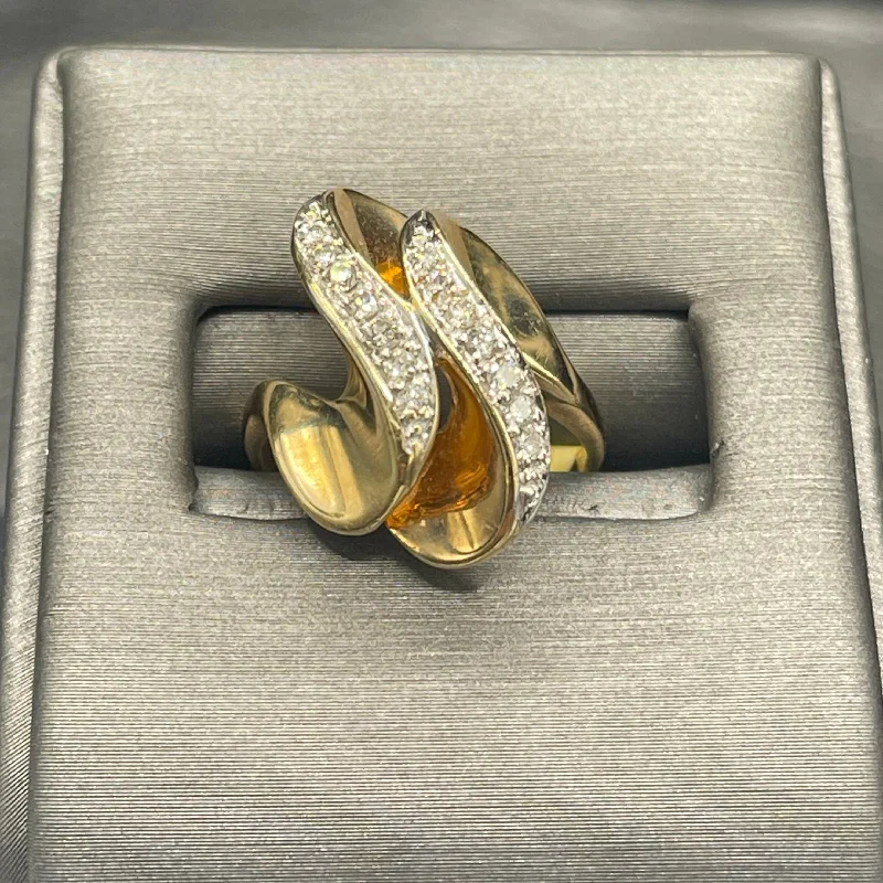 Yellow diamond engagement ring for women-A Ladies 14 Karat Yellow Gold Double Diamond Swirl Cocktail Ring